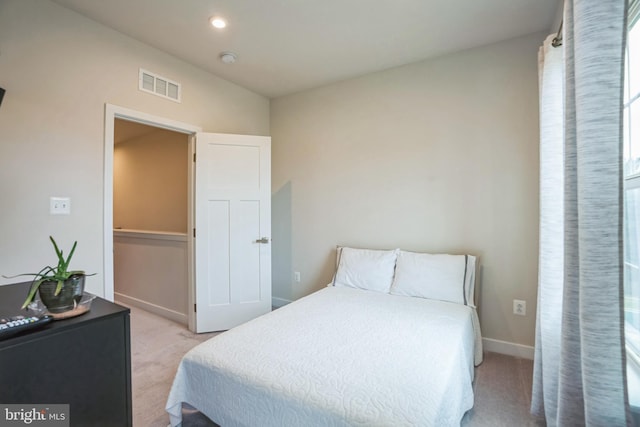 bedroom with recessed lighting, baseboards, visible vents, and light colored carpet