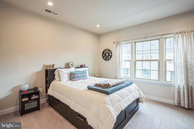 bedroom with recessed lighting, carpet flooring, visible vents, and baseboards