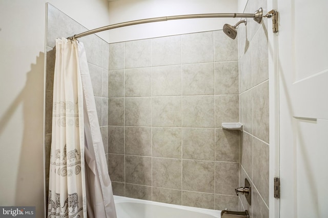 bathroom featuring shower / bath combination with curtain