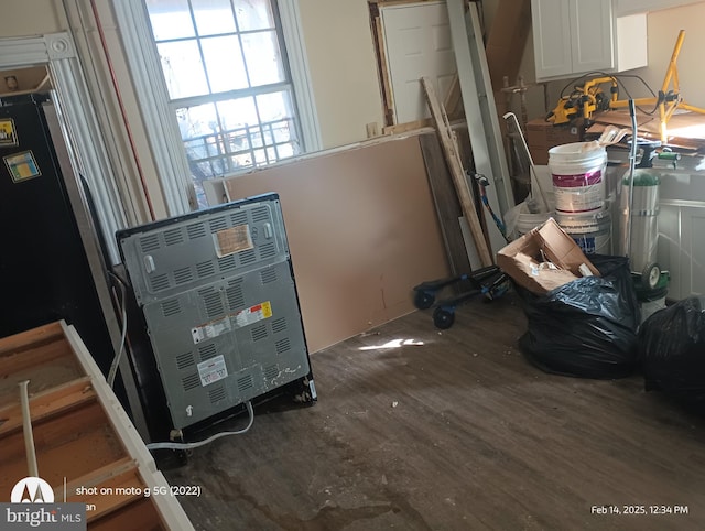 utility room with heating unit