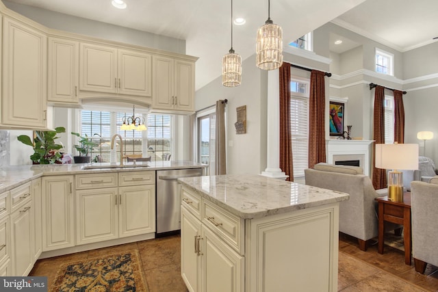 kitchen with light stone counters, a fireplace, a sink, stainless steel dishwasher, and an inviting chandelier