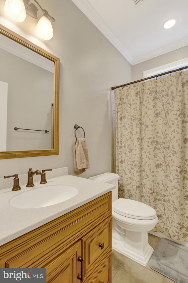 bathroom with tile patterned flooring, toilet, visible vents, vanity, and crown molding