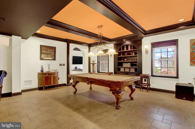 playroom featuring ornamental molding, stone finish floor, visible vents, and baseboards