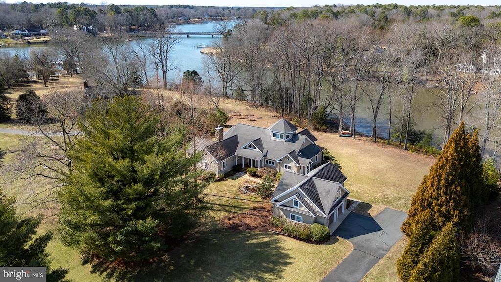 aerial view featuring a water view and a forest view