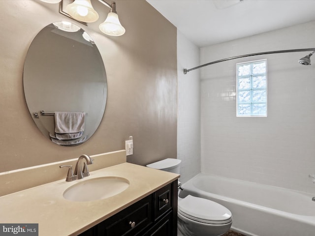 full bath featuring shower / bathing tub combination, vanity, and toilet