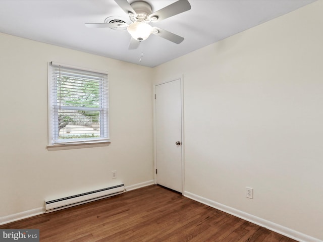 empty room featuring a ceiling fan, a baseboard radiator, baseboards, and wood finished floors