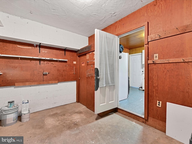 interior space featuring freestanding refrigerator