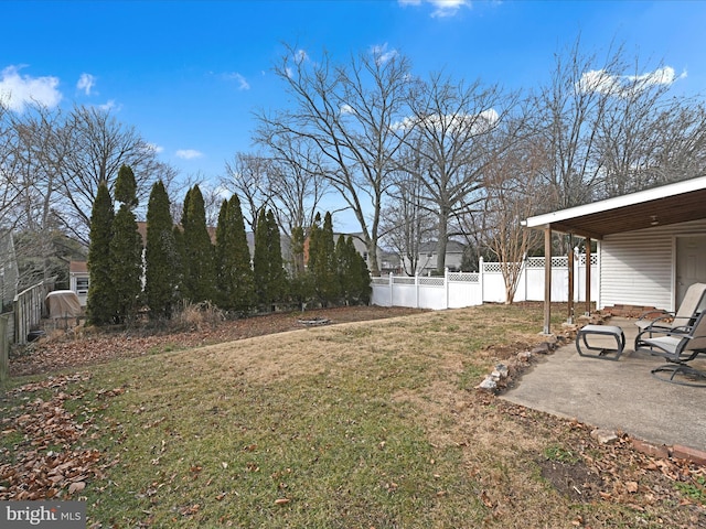 view of yard featuring a patio area and fence