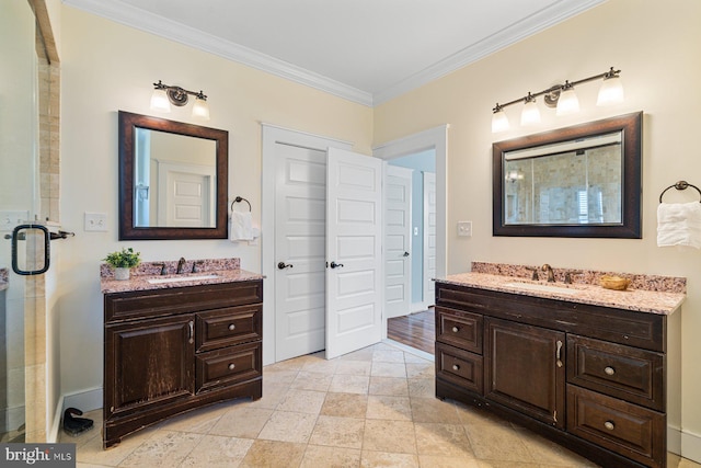 full bathroom with a sink, two vanities, and ornamental molding