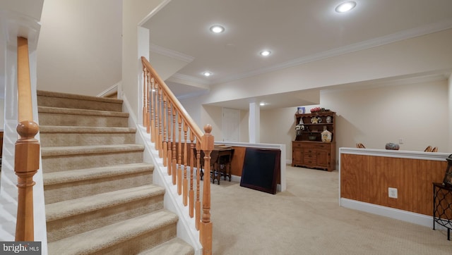 staircase featuring baseboards, carpet floors, ornamental molding, and recessed lighting