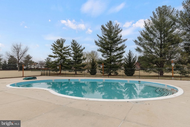 view of pool featuring a fenced in pool and fence