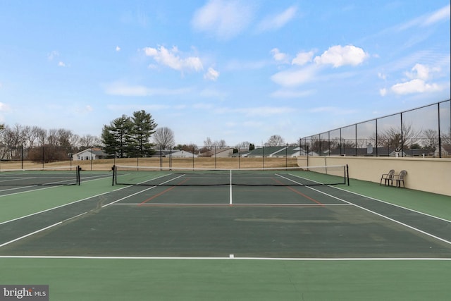 view of sport court with community basketball court and fence