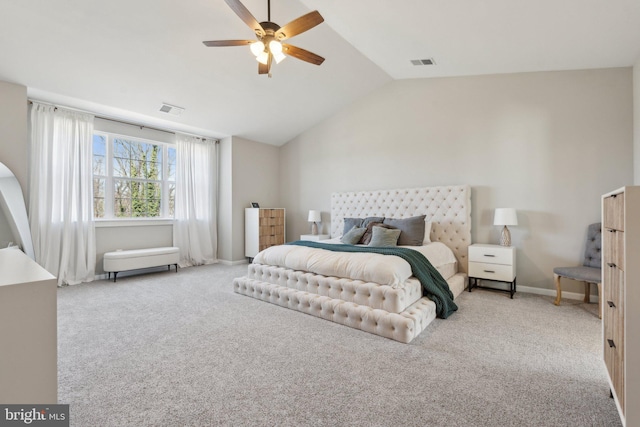 carpeted bedroom with visible vents, baseboards, a ceiling fan, and vaulted ceiling