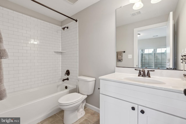 full bath featuring tile patterned floors, visible vents, toilet, shower / tub combination, and vanity