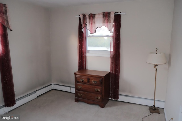 interior space with baseboard heating and a baseboard radiator