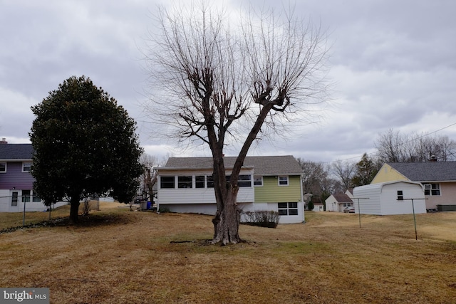 exterior space with a front lawn