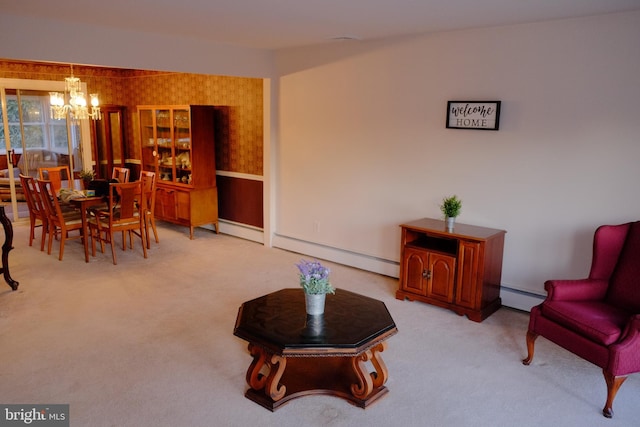 living room featuring a baseboard radiator, carpet flooring, a notable chandelier, and wallpapered walls