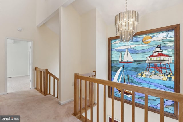 12106 Preston Dr, Lusby, MD 20657 - hallway featuring an upstairs landing, baseboards, lofted ceiling, an inviting chandelier, and carpet