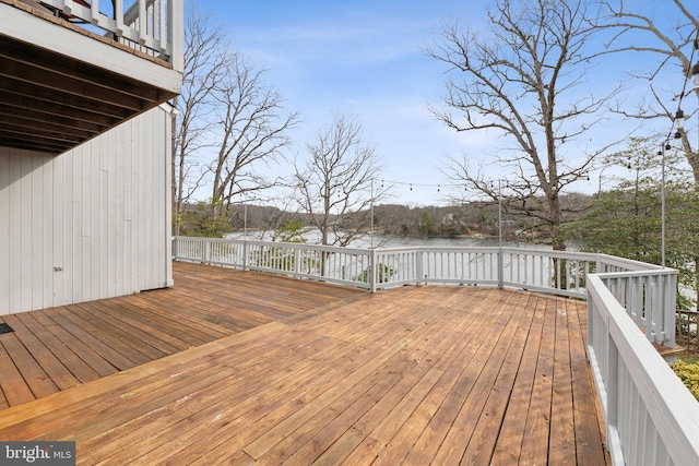 12106 Preston Dr, Lusby, MD 20657 - wooden deck with a water view