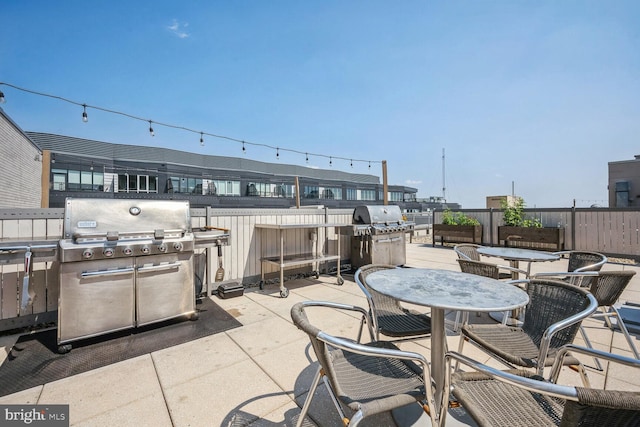 view of patio / terrace with outdoor dining area and grilling area