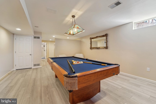 game room with visible vents, baseboards, and light wood-style floors