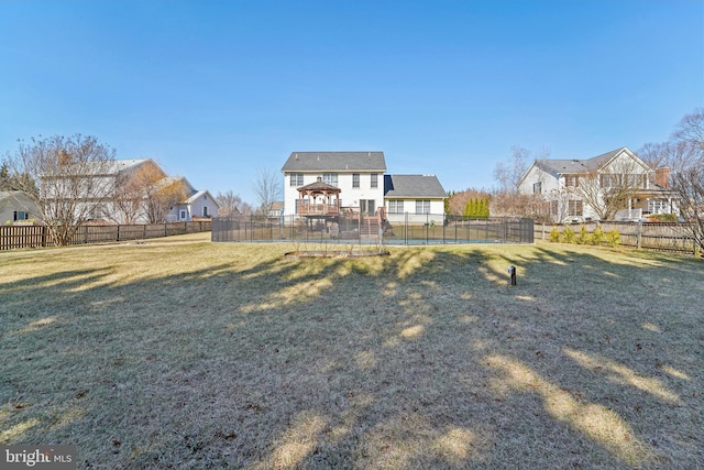 view of yard with a gazebo and a fenced backyard