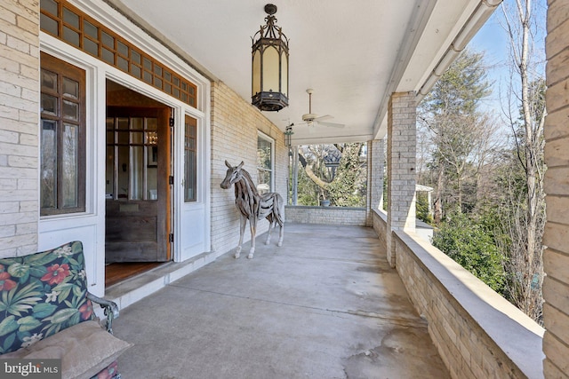 view of patio / terrace with a porch and a ceiling fan