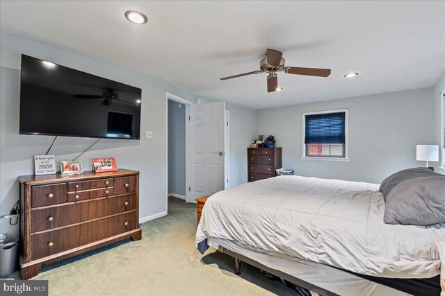 carpeted bedroom featuring recessed lighting, a ceiling fan, and baseboards