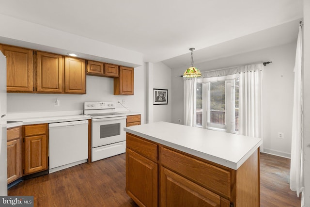 kitchen with white appliances, brown cabinetry, dark wood-style floors, vaulted ceiling, and light countertops