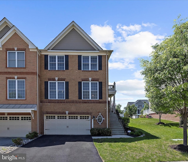 8512 Pine Springs Dr, Severn, MD 21144 - view of property with asphalt driveway, a garage, a front lawn, stairs, and brick siding
