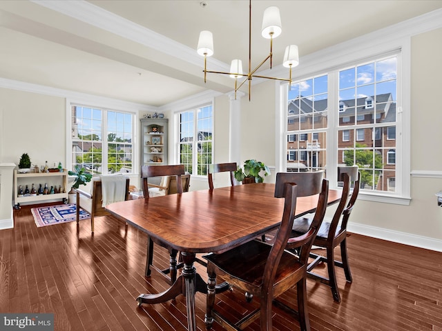 8512 Pine Springs Dr, Severn, MD 21144 - dining space with a chandelier, crown molding, wood finished floors, and baseboards