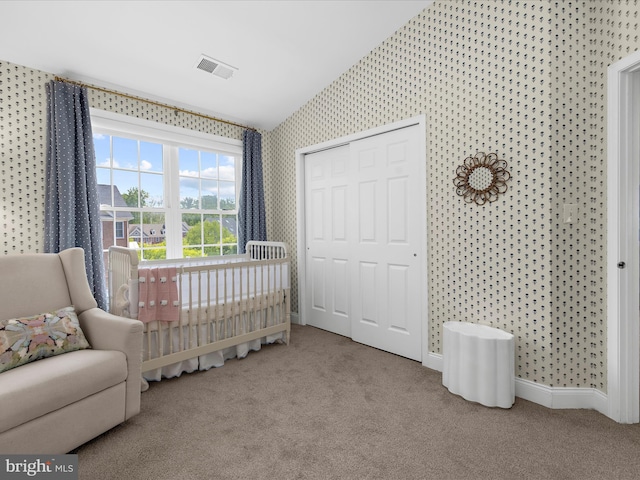 8512 Pine Springs Dr, Severn, MD 21144 - carpeted bedroom with wallpapered walls, baseboards, and a closet
