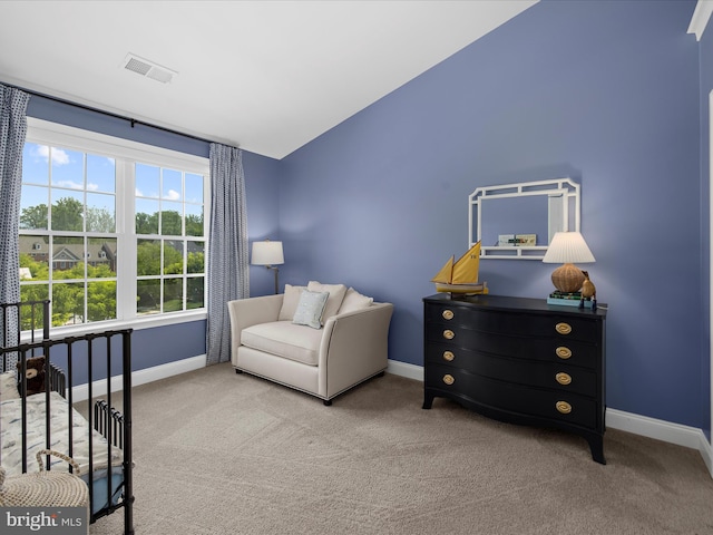 8512 Pine Springs Dr, Severn, MD 21144 - sitting room with baseboards, carpet flooring, and vaulted ceiling