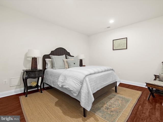 8512 Pine Springs Dr, Severn, MD 21144 - bedroom with baseboards, wood finished floors, and recessed lighting