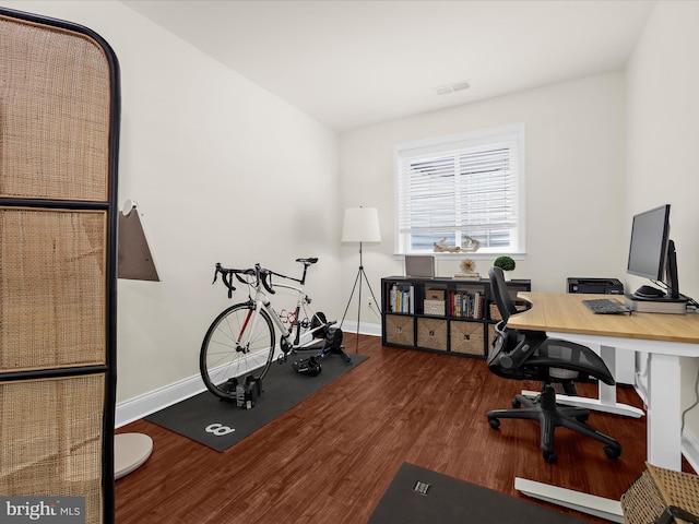 8512 Pine Springs Dr, Severn, MD 21144 - home office with wood finished floors and baseboards