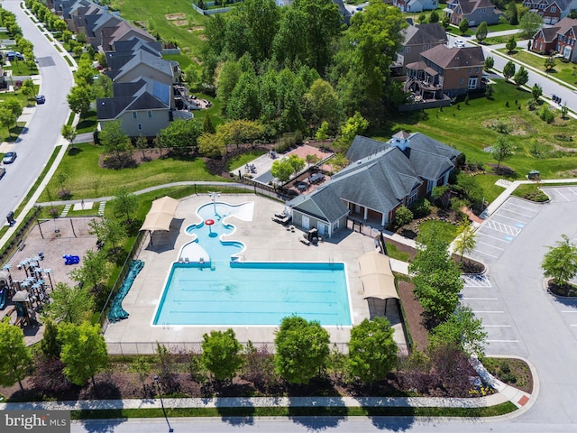 8512 Pine Springs Dr, Severn, MD 21144 - aerial perspective of suburban area with a pool area