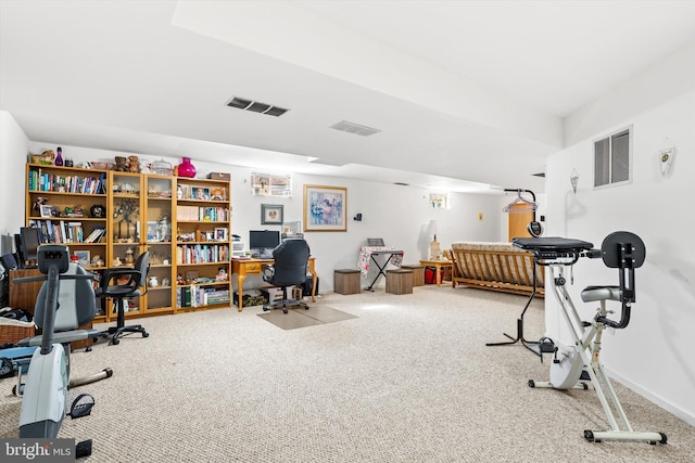 carpeted office featuring visible vents