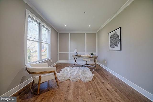 home office featuring baseboards, crown molding, and wood finished floors