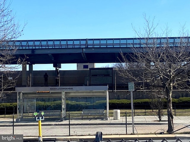 view of building exterior featuring fence