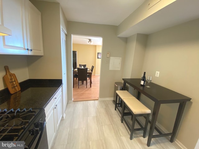 interior space with baseboards and extractor fan