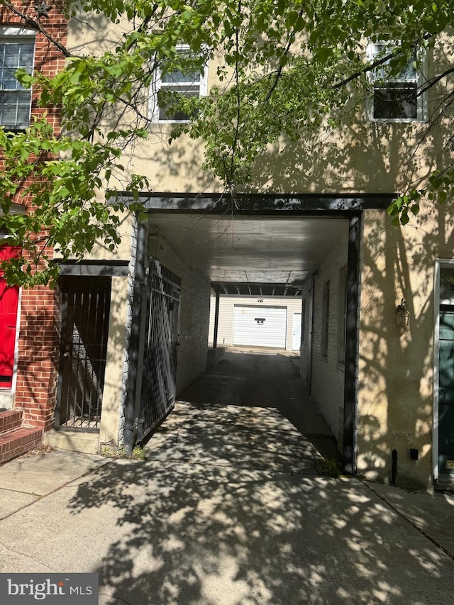 exterior space featuring a gate