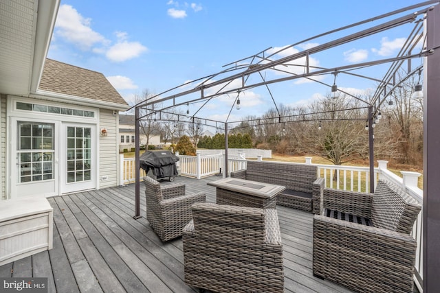 deck featuring an outdoor hangout area and area for grilling