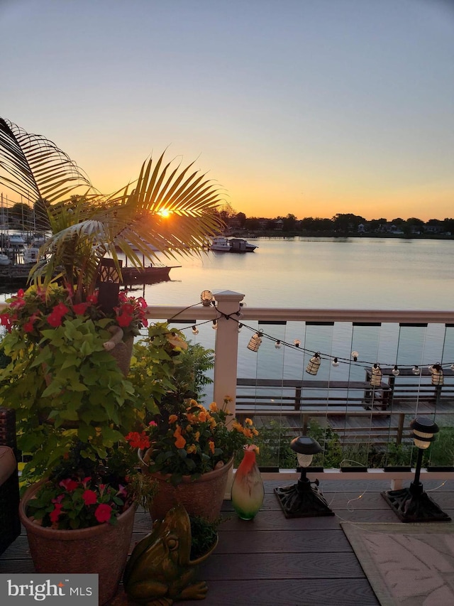 deck at dusk with a water view