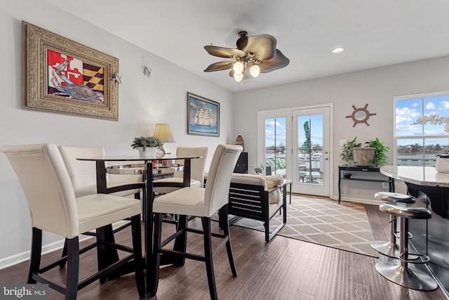 dining space with recessed lighting, ceiling fan, baseboards, and wood finished floors