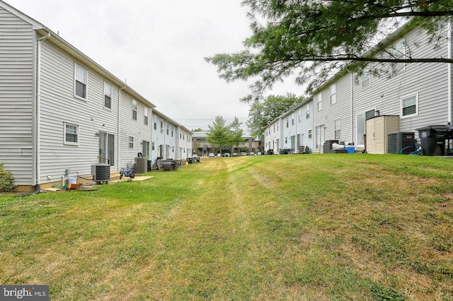 view of yard featuring central AC unit