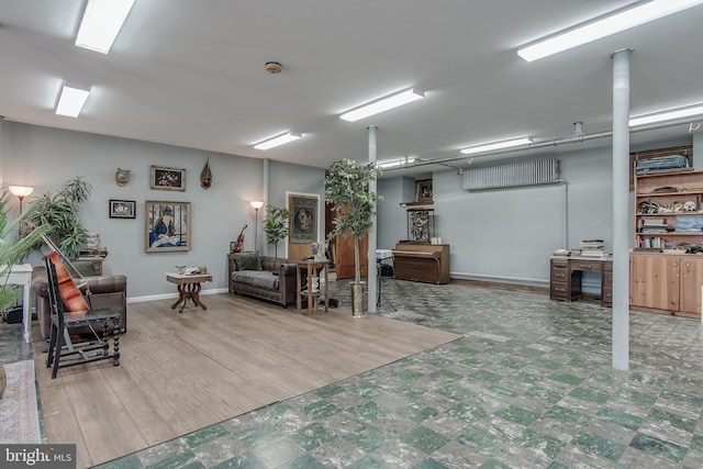 interior space featuring baseboards and tile patterned floors