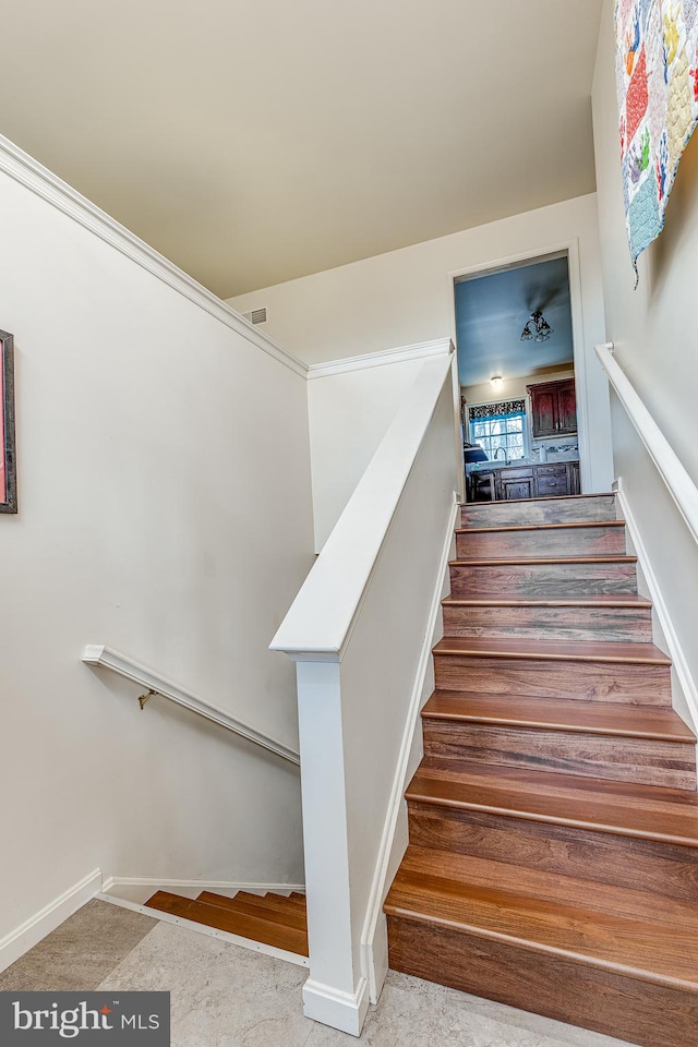 staircase with baseboards