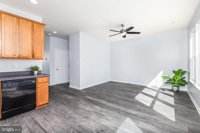 kitchen featuring baseboards, dark wood finished floors, recessed lighting, black dishwasher, and dark countertops