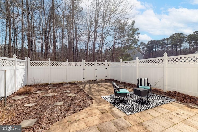 view of patio featuring a fenced backyard