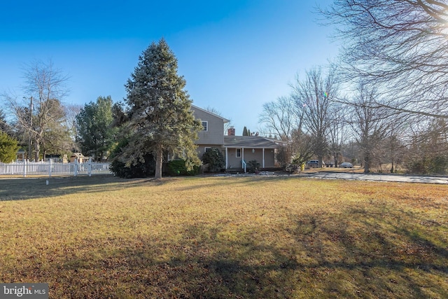 view of yard with fence